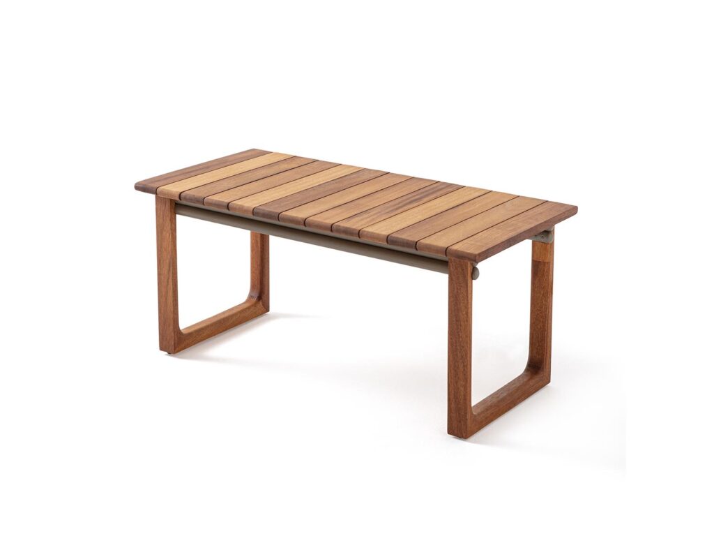 Rectangular wooden coffee table with slatted top and minimalist design for hotel lounge use.