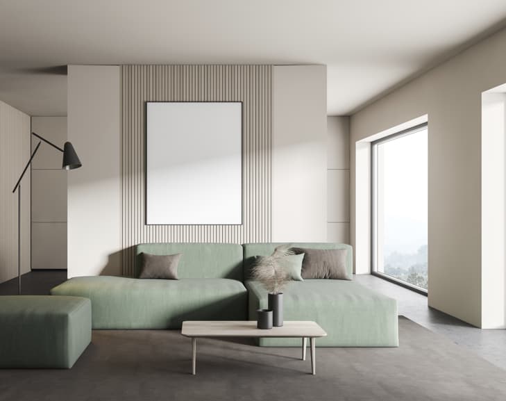 Modern hotel suite sofa with coffee table and soft neutral tones