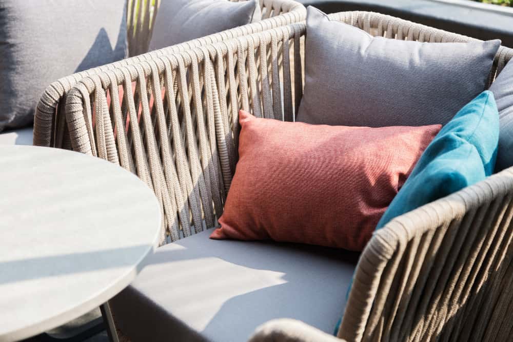 Cozy outdoor seating with cushions.